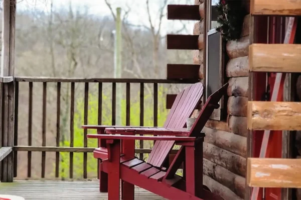 Red Roof Retreats - Red Roof Log Cabin, exterior - front porch - Lake of Egypt - Goreville, IL